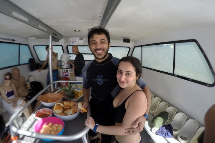 enjoying lunch on the snorkeling boat